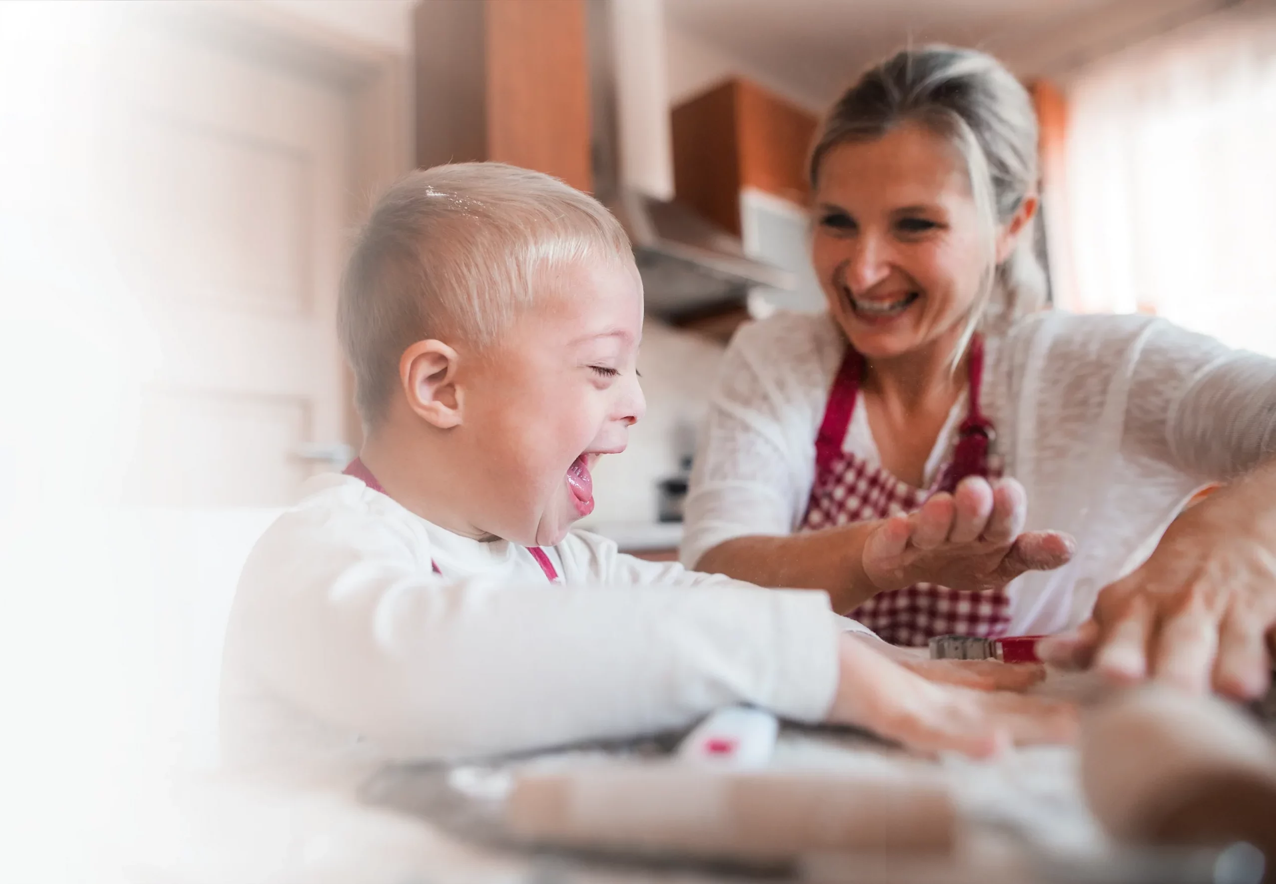 Mother and child baking together