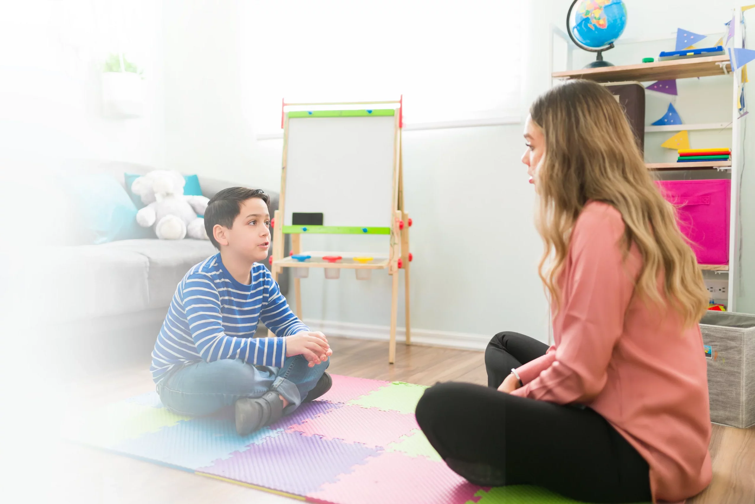 Child speaking with a therapist