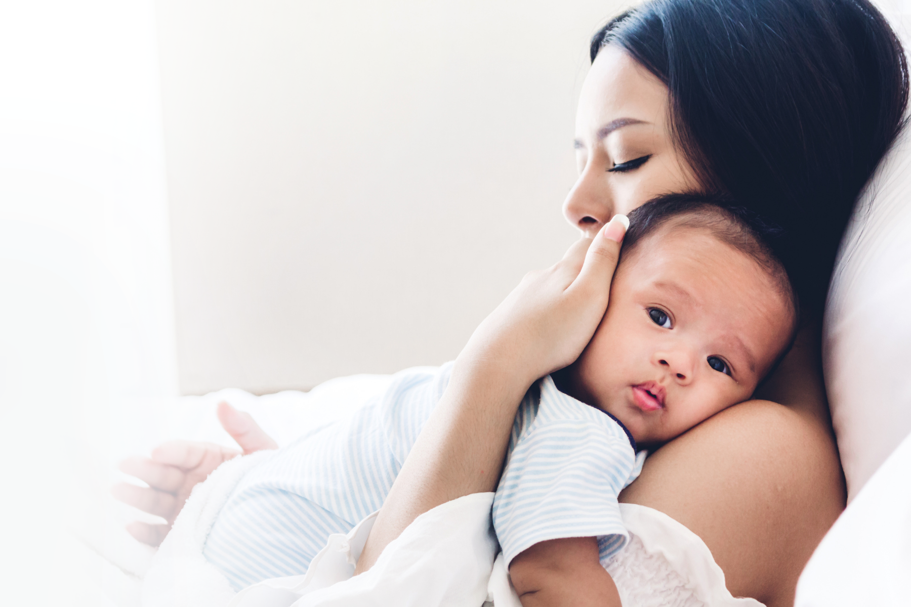 Hispanic Mom with new born baby