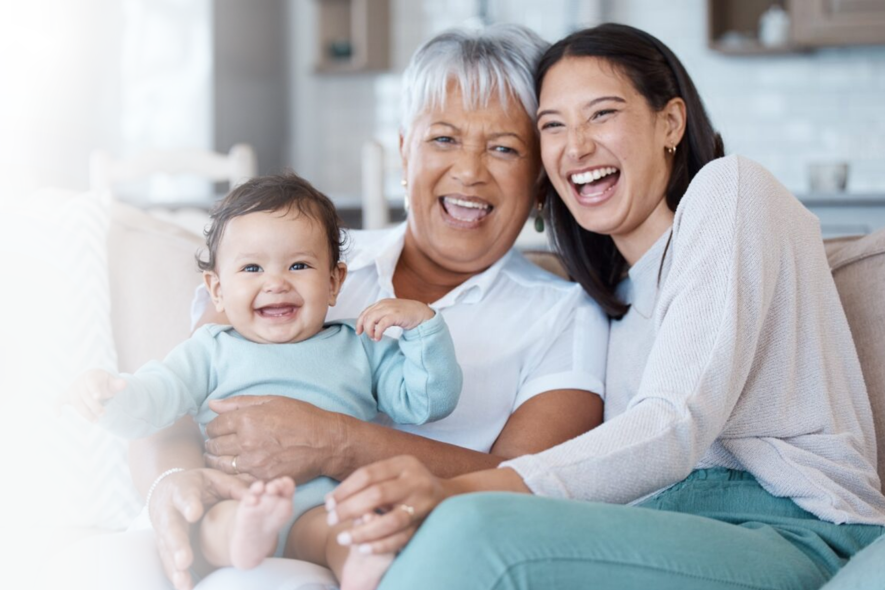 Mother, Grandmother and Baby in a home. Hispanic/Native family