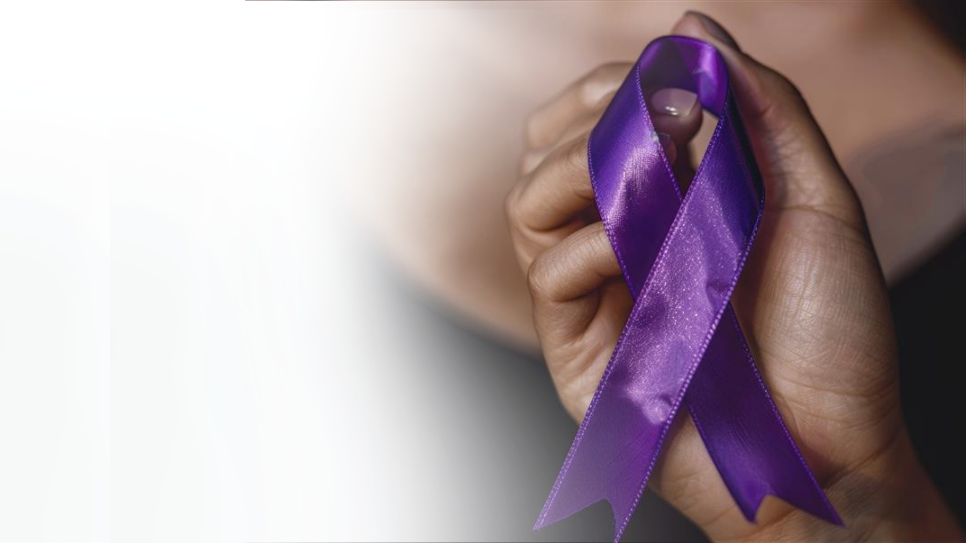 Purple Ribbon in hand